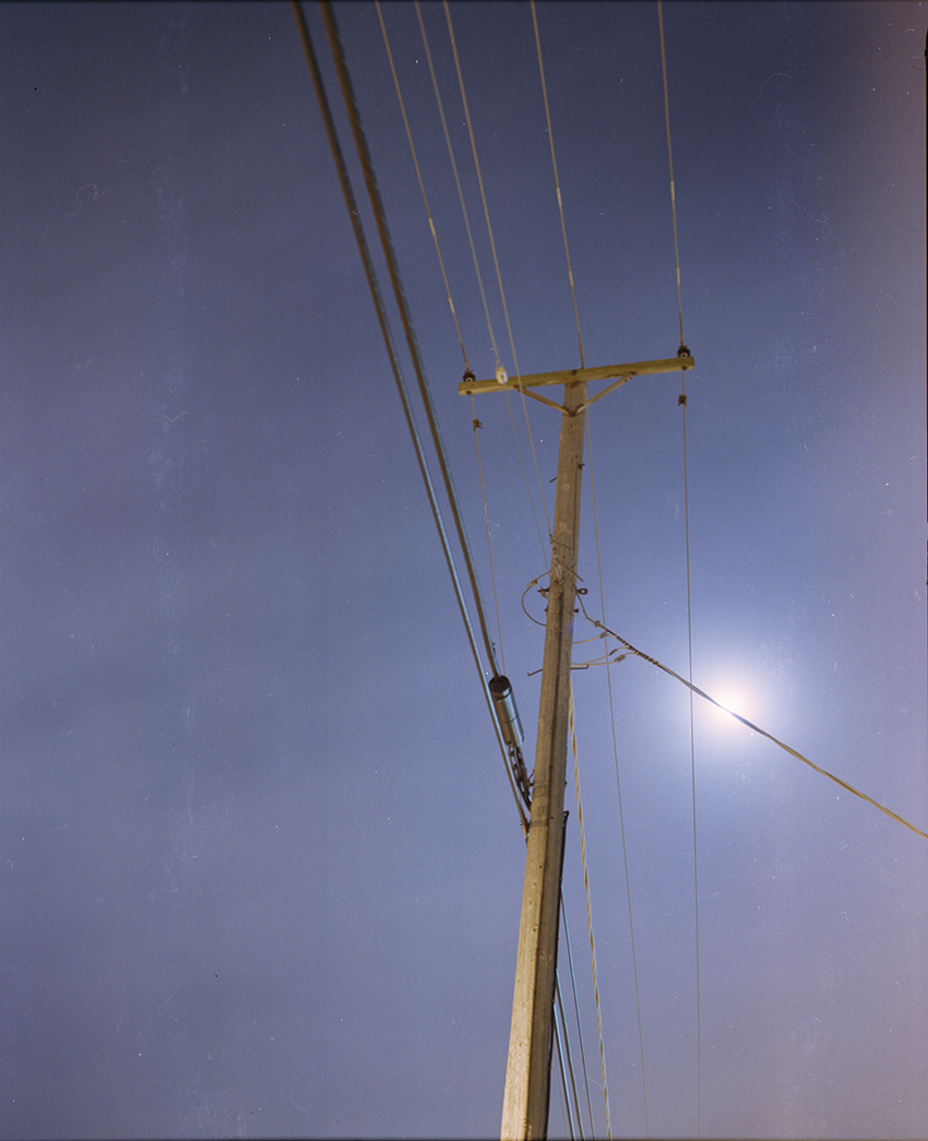 Utility Pole and Moon