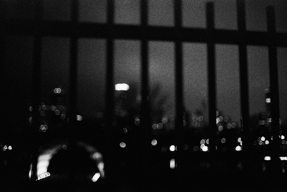 Downtown Through a Fence