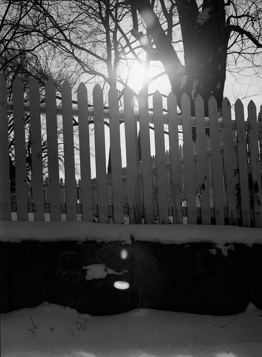 Sun and Picket Fence