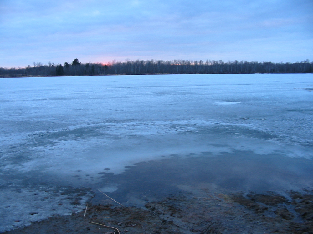Thawed Shore and Frozen Lake